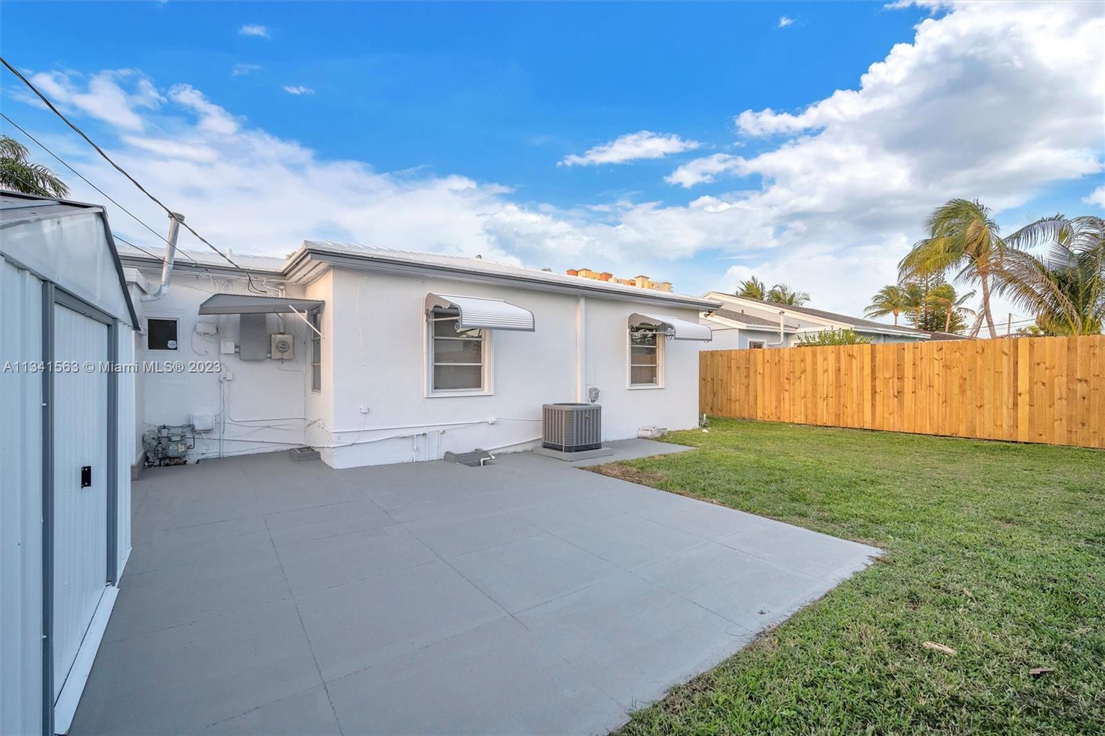 217 East 24th Street Riviera Beach, FL 33404 - Photo 19 of 27 a view of a backyard