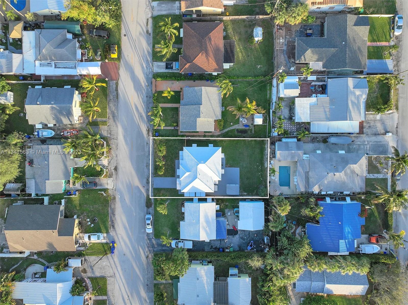 217 East 24th Street Riviera Beach, FL 33404 - Photo 21 of 27 an aerial view of houses and roads