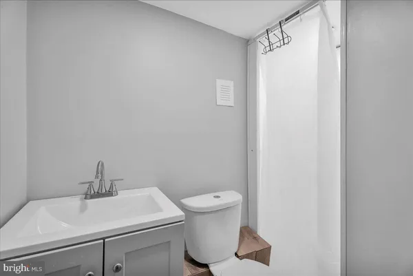 a bathroom with a sink and a toilet