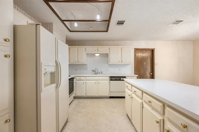 an empty room with a ceiling fan and a window