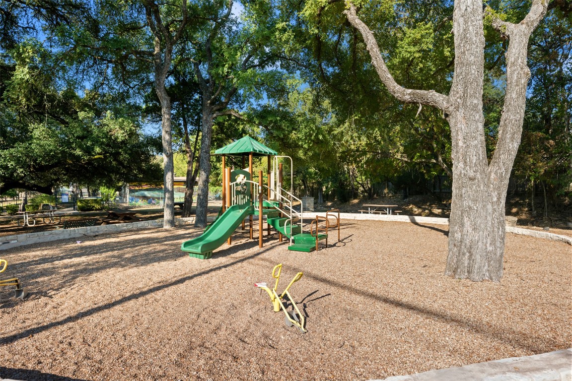 9424 El Rey Boulevard Austin, TX 78737 - Photo 32 of 35 a view of a park with slide