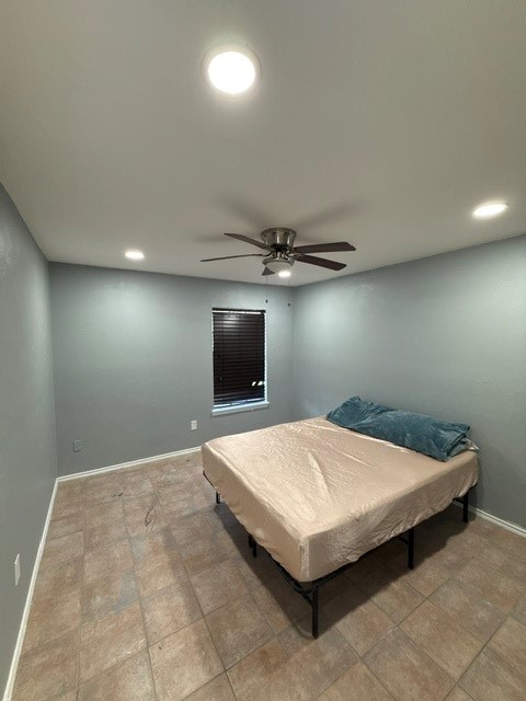 23311 Whittaker Way Spring, TX 77373 - Photo 7 of 12 a bed sitting in a room and a flat screen tv
