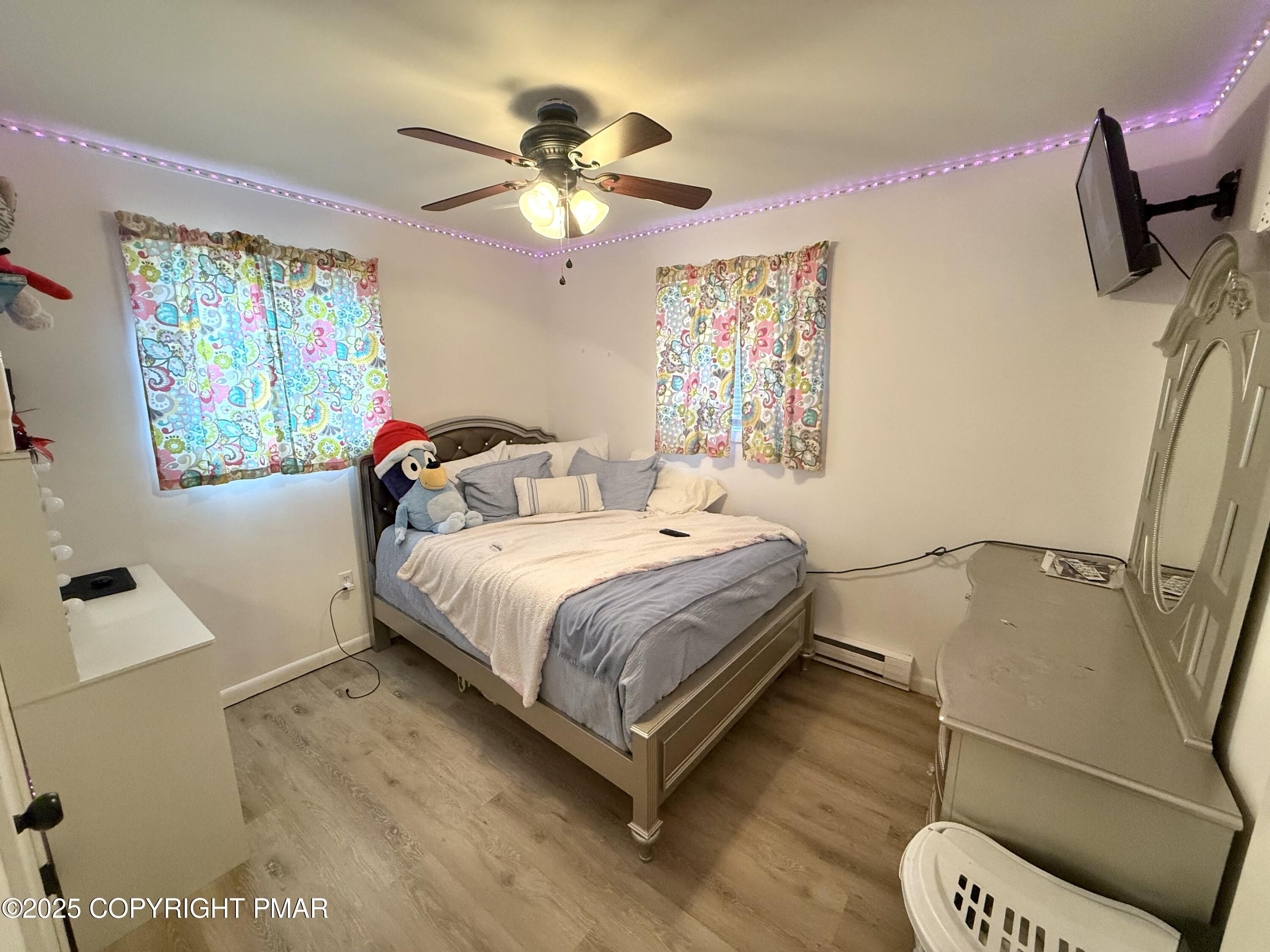 114 Maccauley Road Albrightsville, PA 18210 - Photo 13 of 21 a bedroom with a bed and painting on the wall