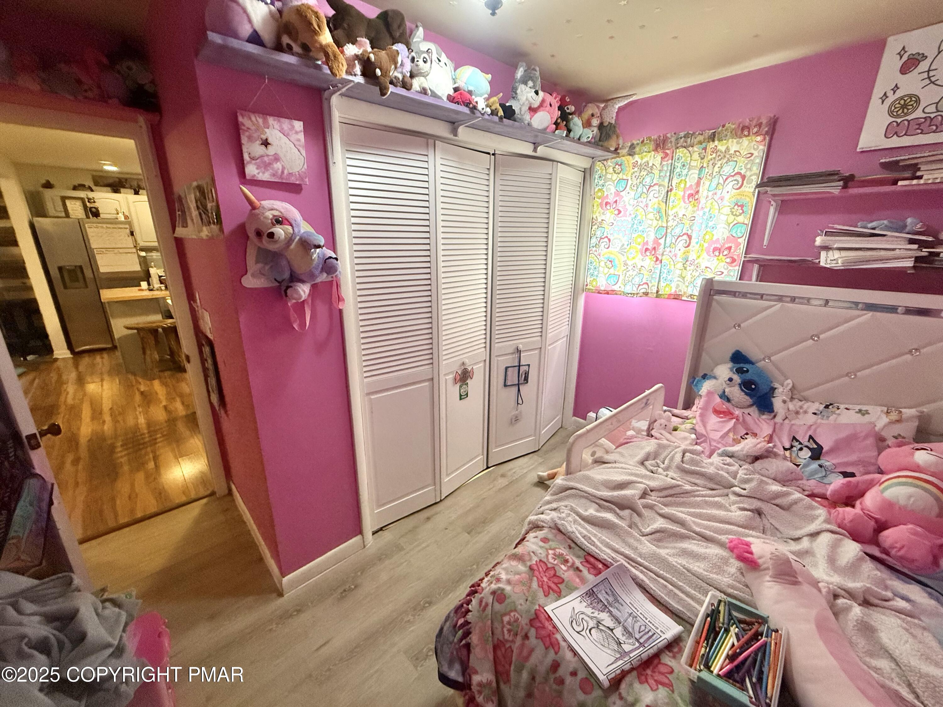 114 Maccauley Road Albrightsville, PA 18210 - Photo 16 of 21 a bedroom with a bed and a window