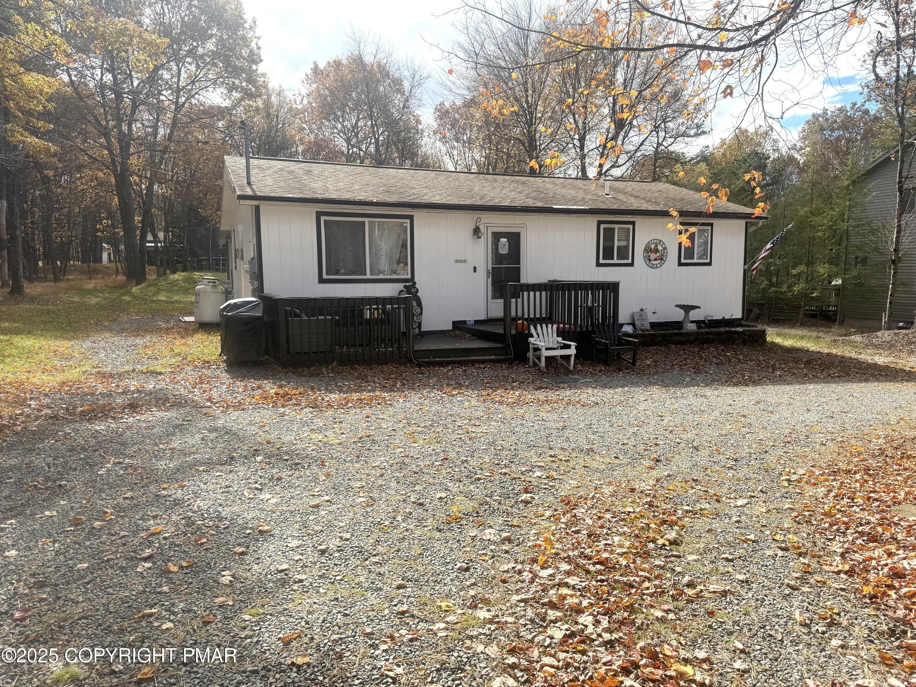 114 Maccauley Road Albrightsville, PA 18210 - Photo 18 of 21 a view of a house with a yard covered in snow