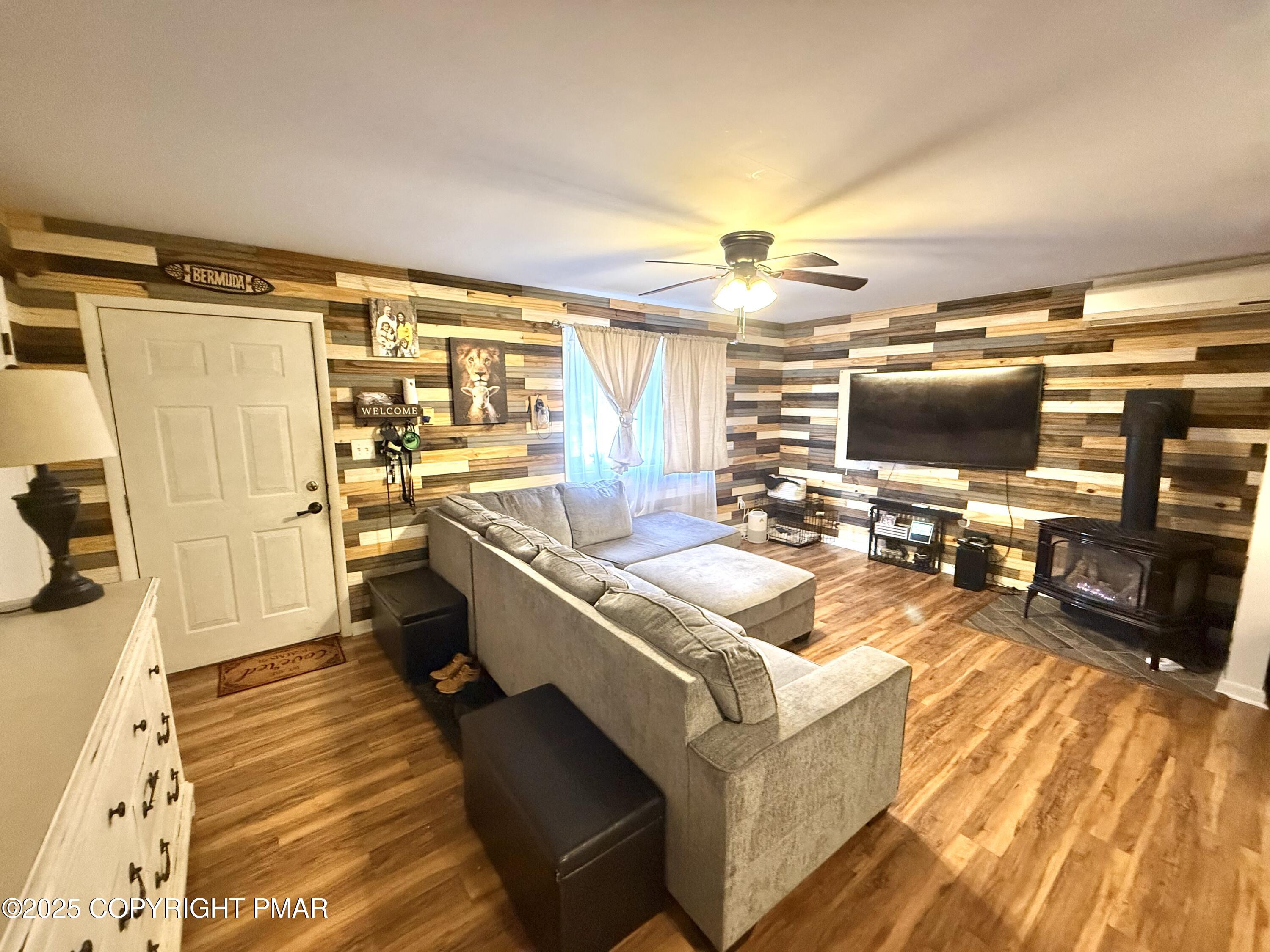 114 Maccauley Road Albrightsville, PA 18210 - Photo 4 of 21 a living room with stainless steel appliances furniture stove and a kitchen view