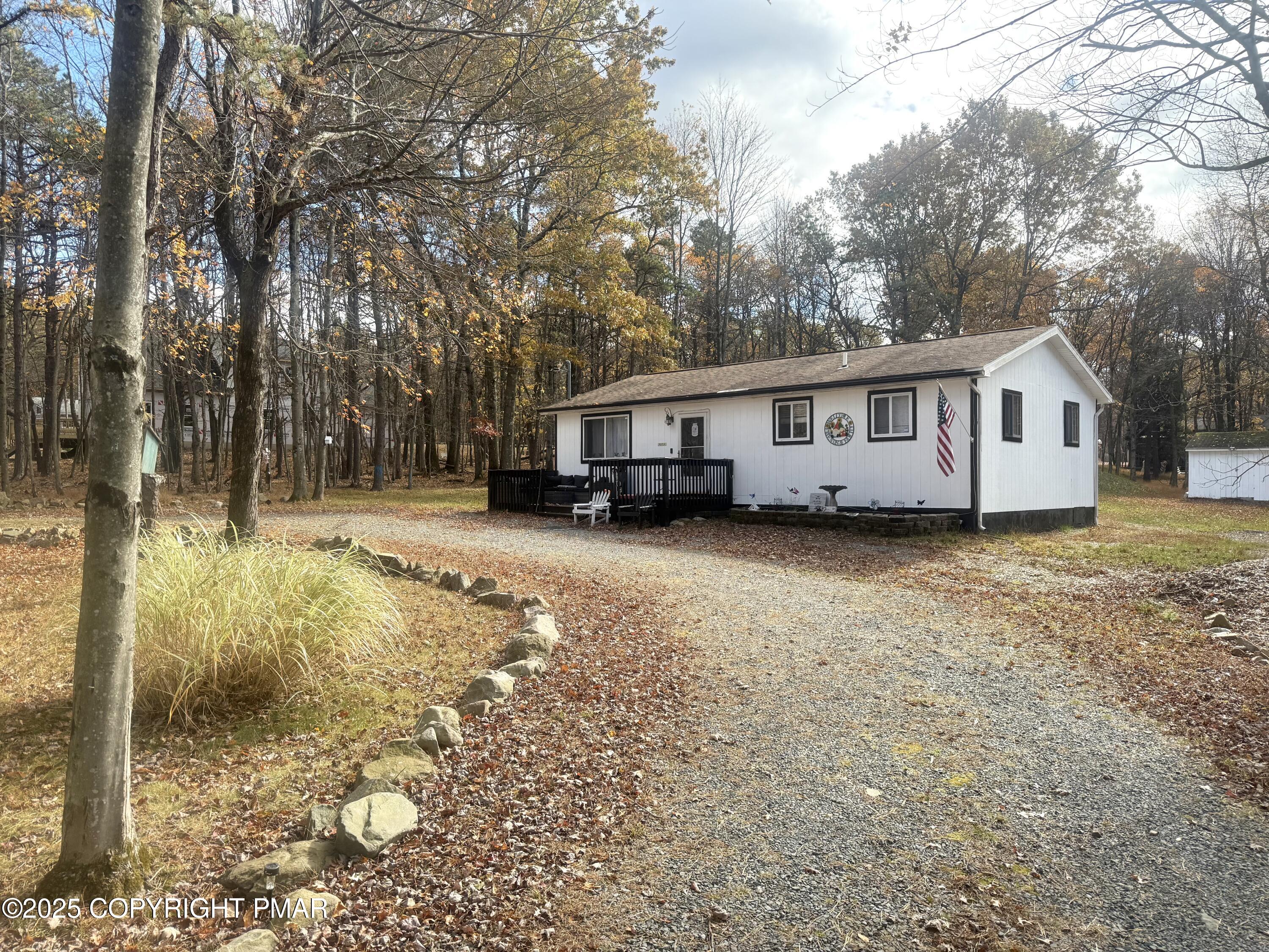 114 Maccauley Road Albrightsville, PA 18210 - Photo 6 of 21 a view of a house with a yard covered in snow