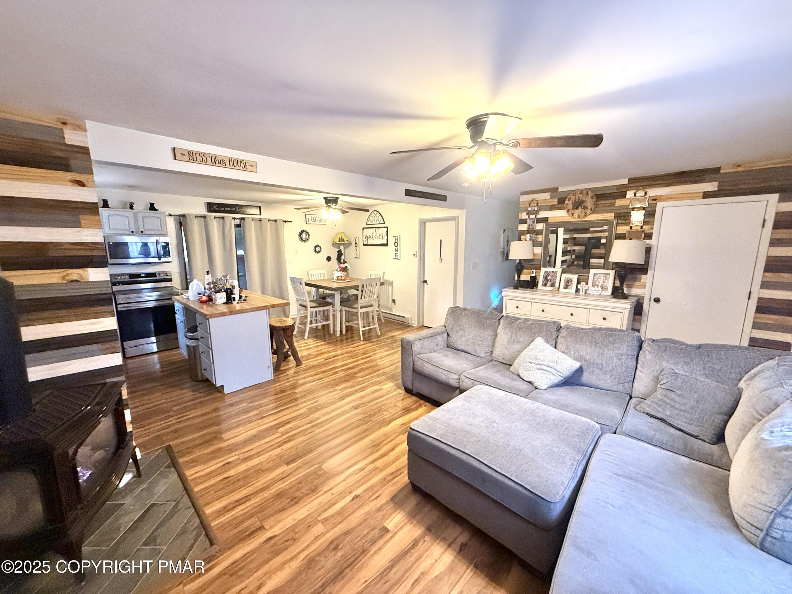 114 Maccauley Road Albrightsville, PA 18210 - Photo 7 of 21 a living room with furniture and wooden floor