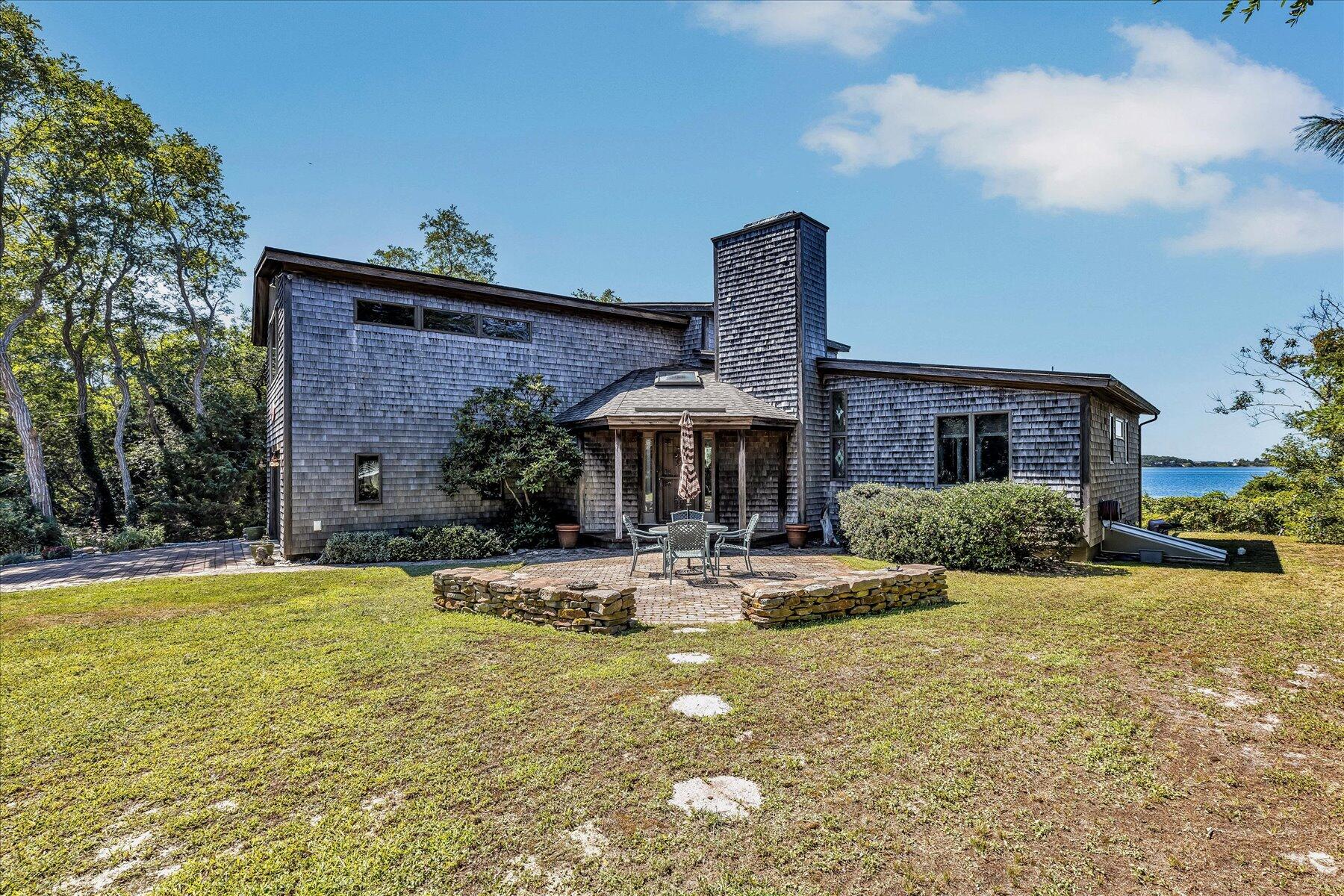 20 Catboat Road Wellfleet, MA 02667 - Photo 11 of 53 a view of a house with swimming pool and sitting area