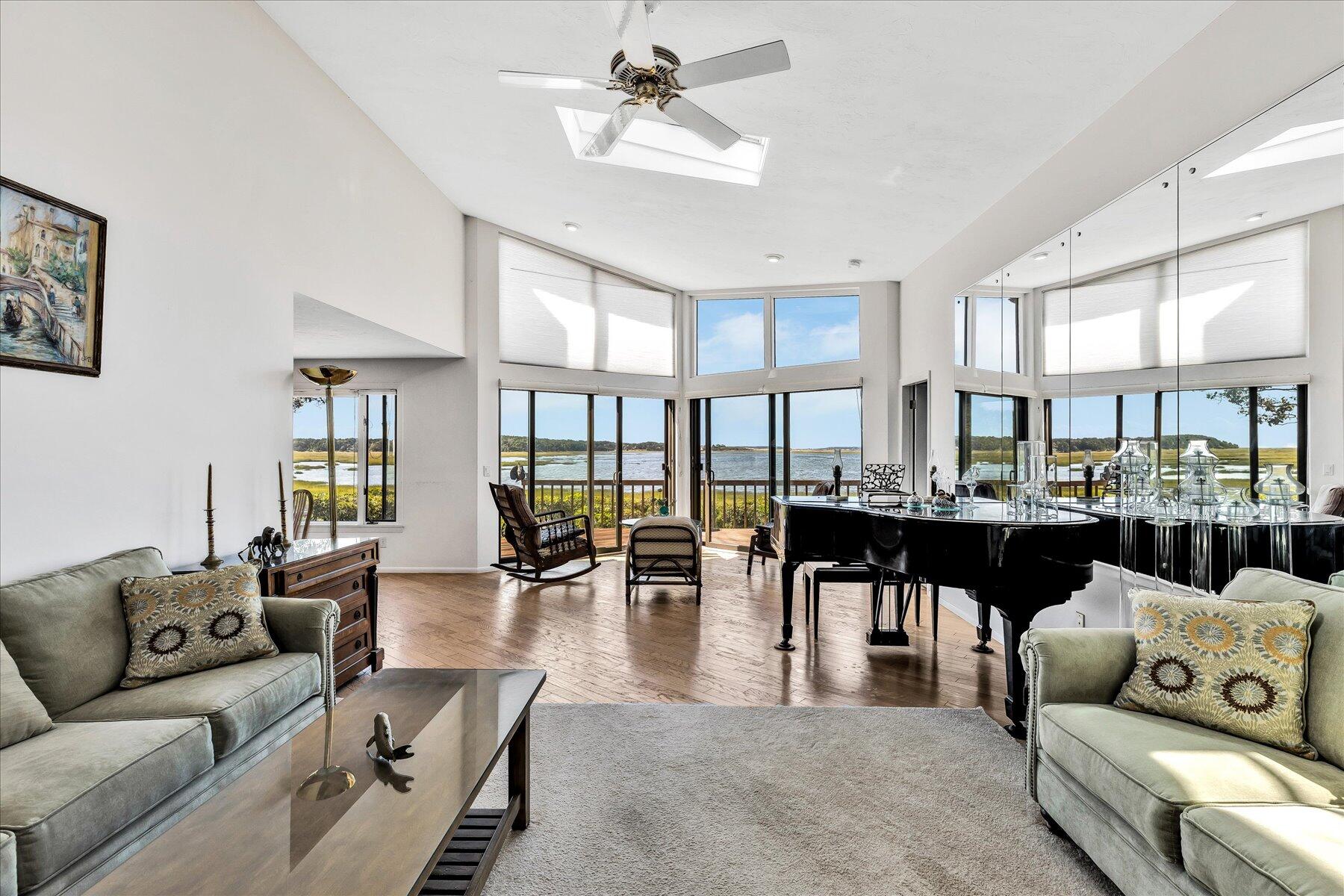 20 Catboat Road Wellfleet, MA 02667 - Photo 29 of 53 a living room with furniture kitchen view and a large window
