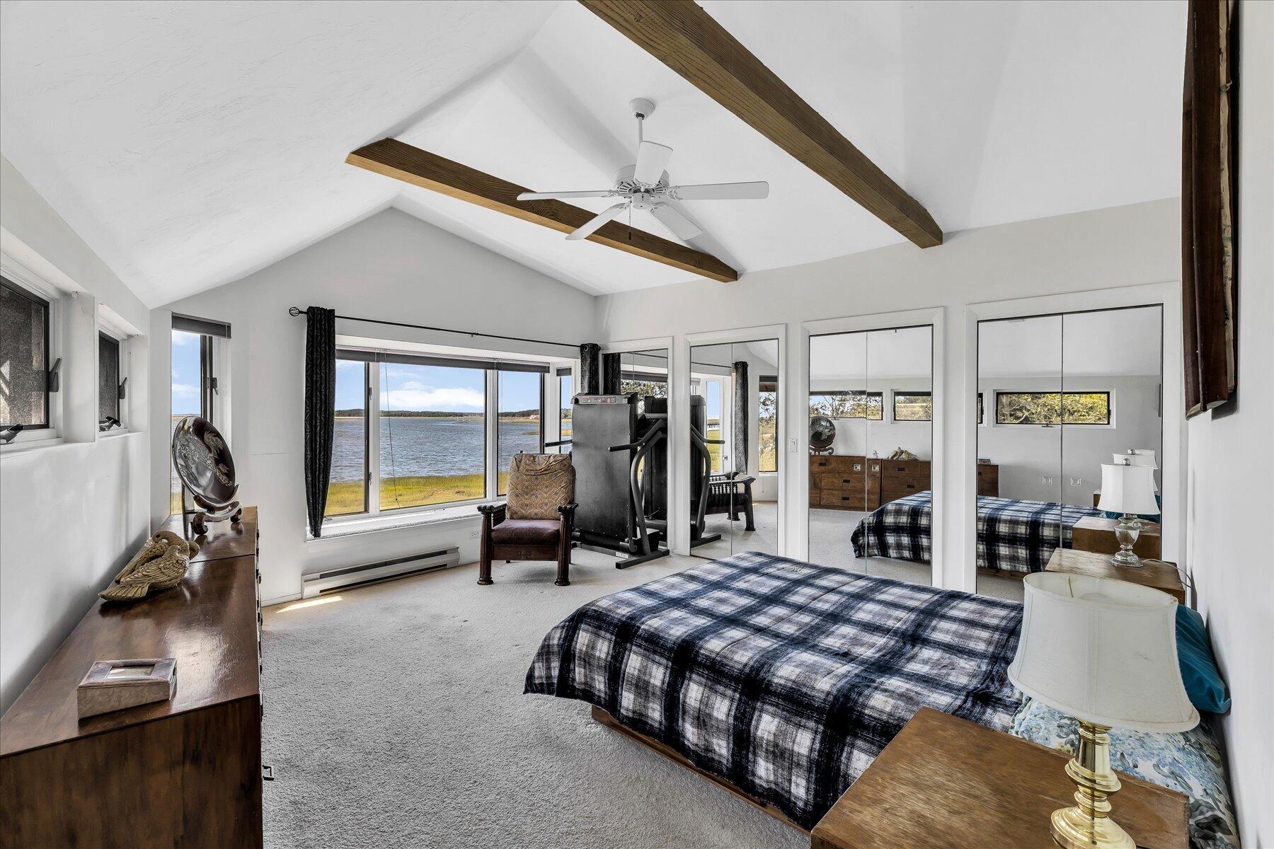 20 Catboat Road Wellfleet, MA 02667 - Photo 38 of 53 a bed room with a bed and large mirror