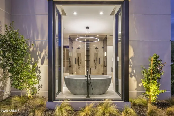 a view of a patio with swimming pool table and chairs