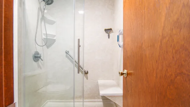 a view of an empty room with a window