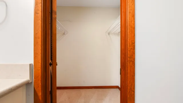 a view of a room with a bathroom