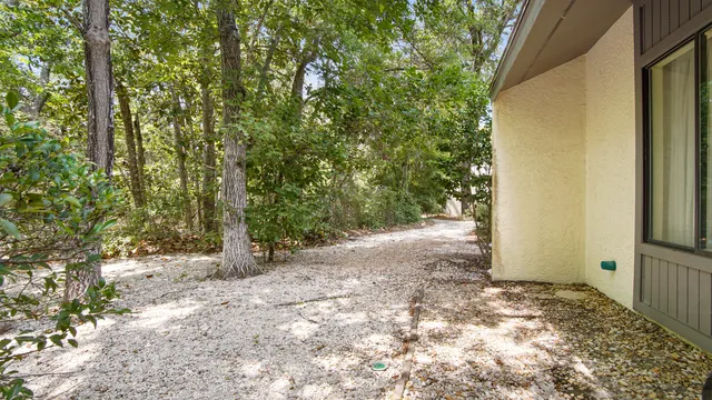 a view of a lake with sitting area