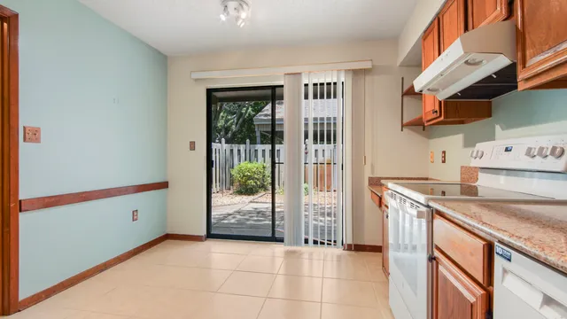 a view of a bathroom from a hallway