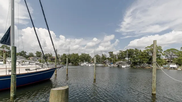 a bathroom with a shower and a sink