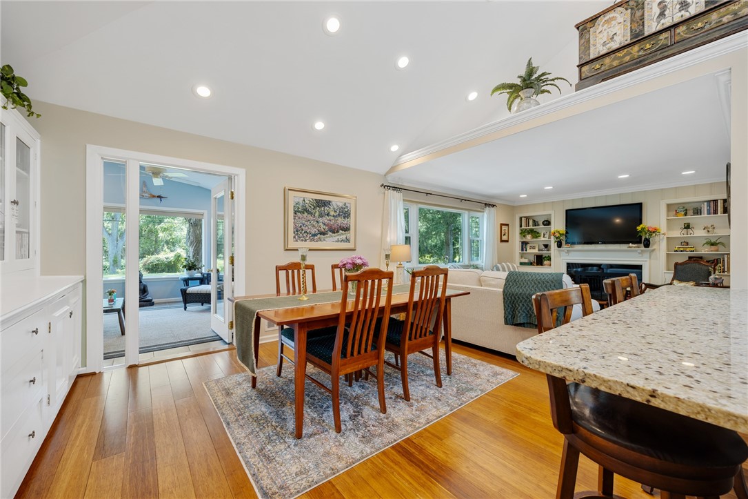 99 French Road Pittsford, NY 14618 - Photo 21 of 49 ENTERTAINMENT SIZED DINING AREA OFF GREATROOM WITH CUSTOM BUILT-INS