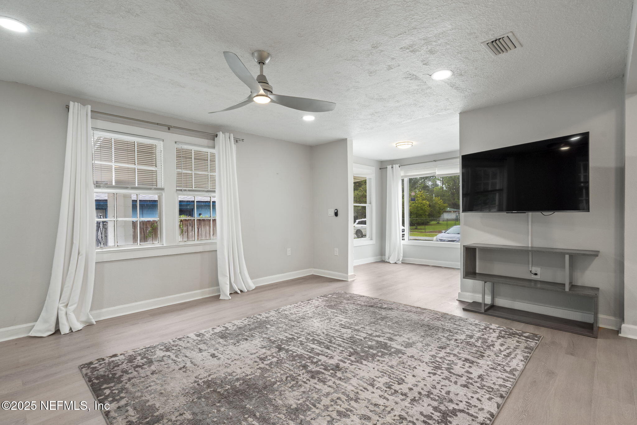 3910 Grant Road Jacksonville, FL 32207 - Photo 15 of 36 a view of livingroom with furniture window and wooden floor
