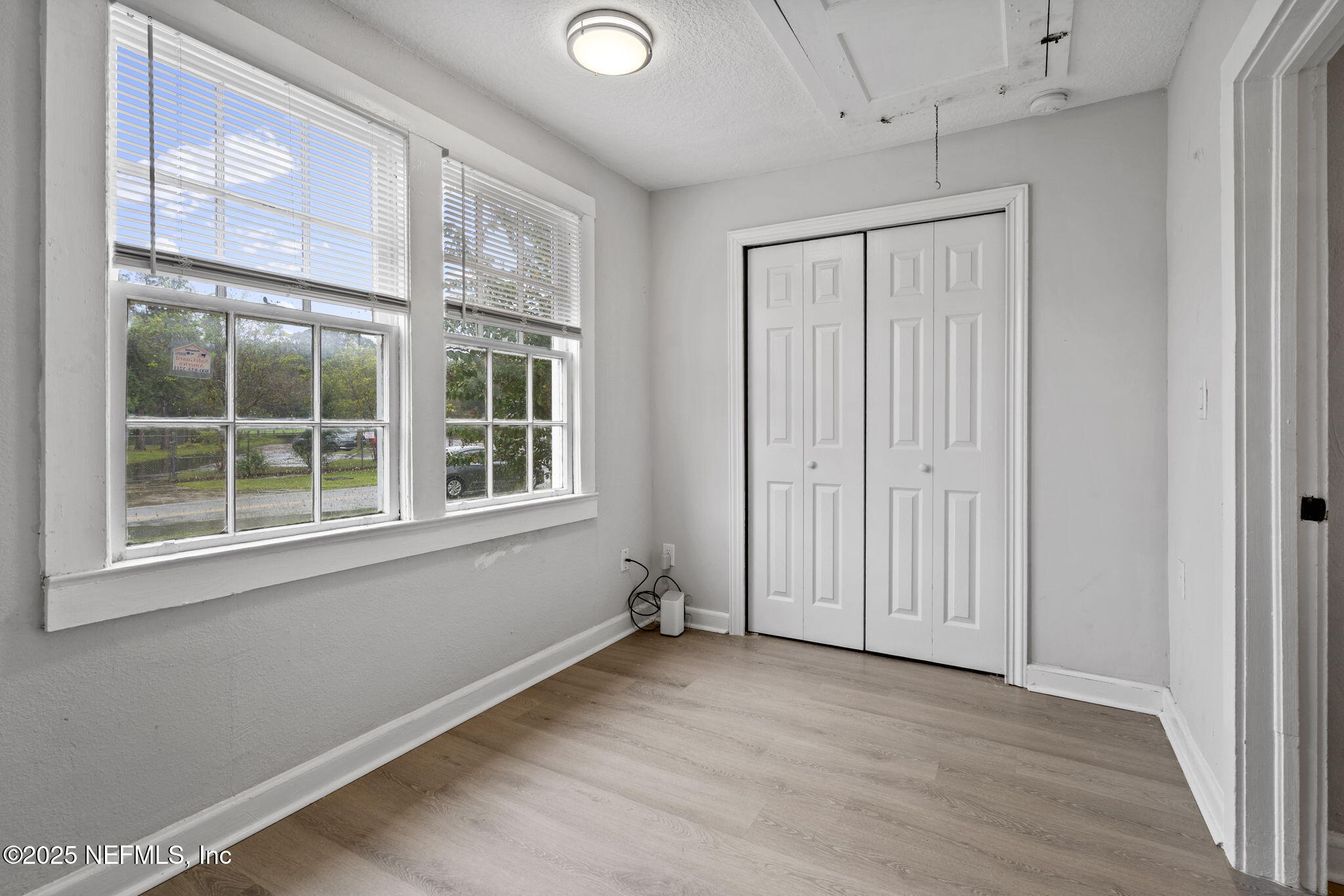 3910 Grant Road Jacksonville, FL 32207 - Photo 18 of 36 a view of an empty room with a window
