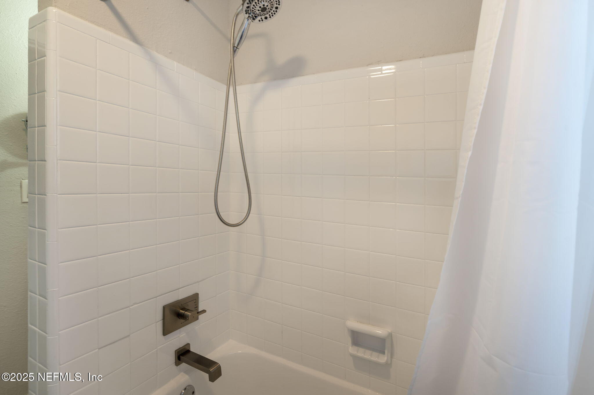3910 Grant Road Jacksonville, FL 32207 - Photo 20 of 36 a bathroom with a shower
