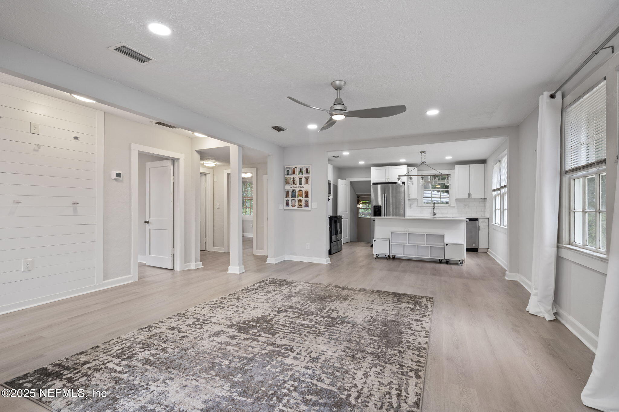 3910 Grant Road Jacksonville, FL 32207 - Photo 4 of 36 a living room with furniture and wooden floor