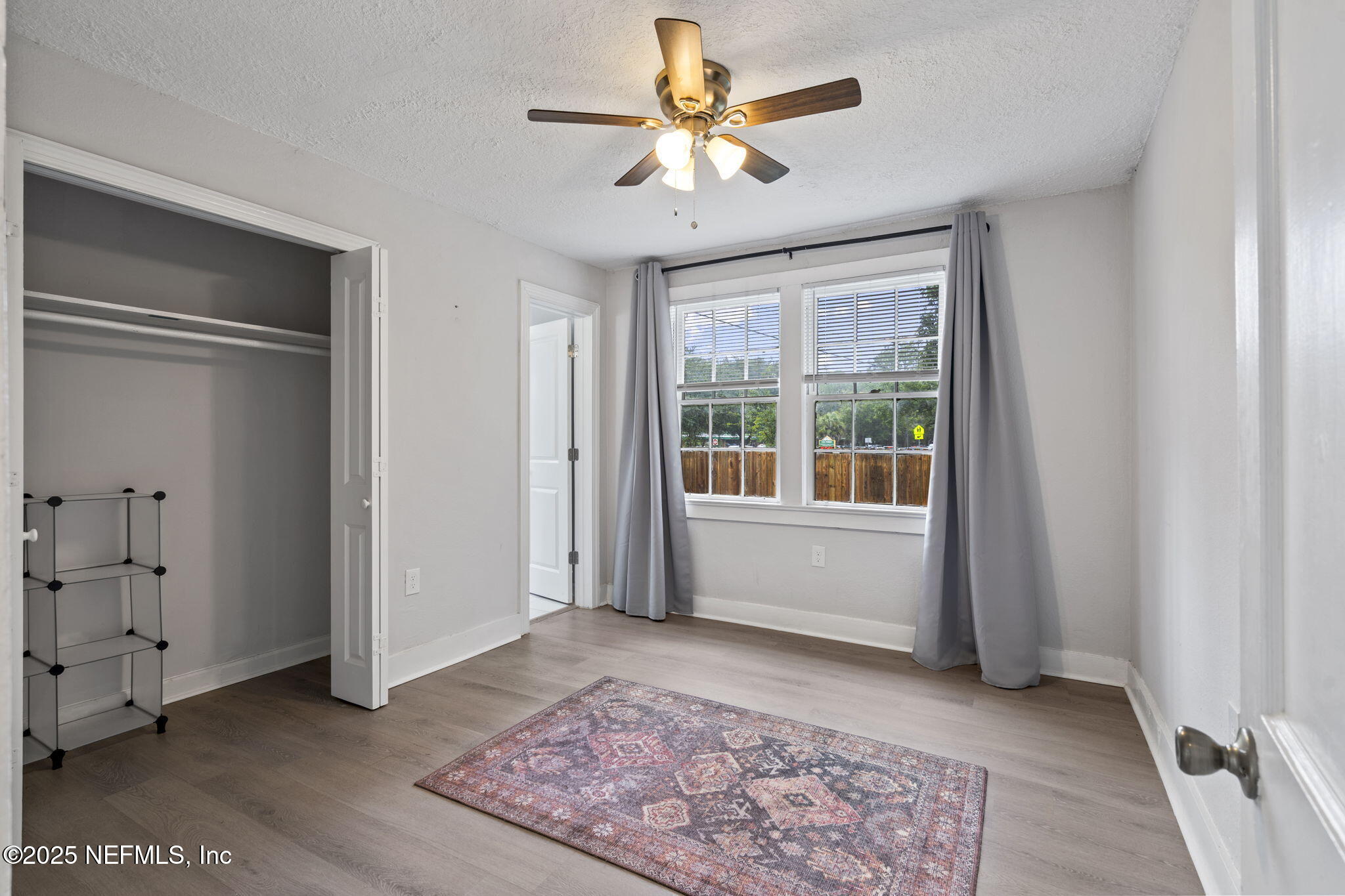 3910 Grant Road Jacksonville, FL 32207 - Photo 10 of 36 a living room with furniture and a rug
