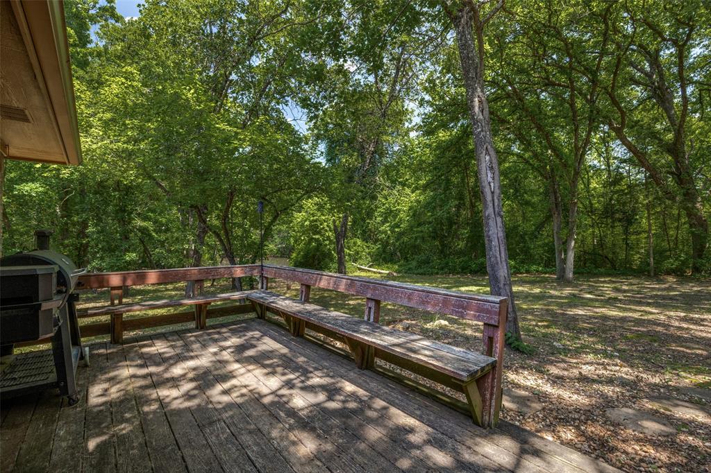 4942 Highway 69 Denison, TX 75021 - Photo 6 of 27 Side deck overlooks side yard and your private pond.