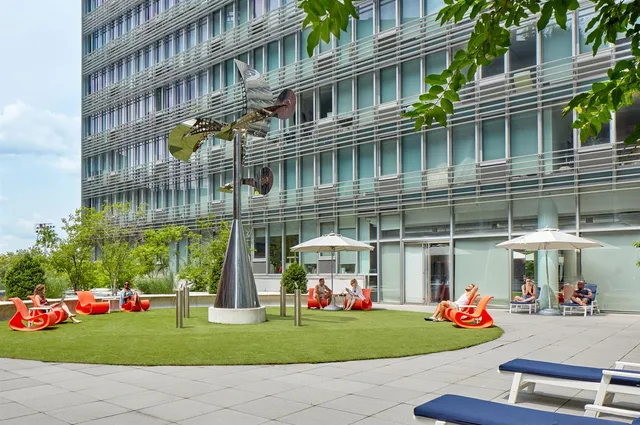 a view of a building with a street