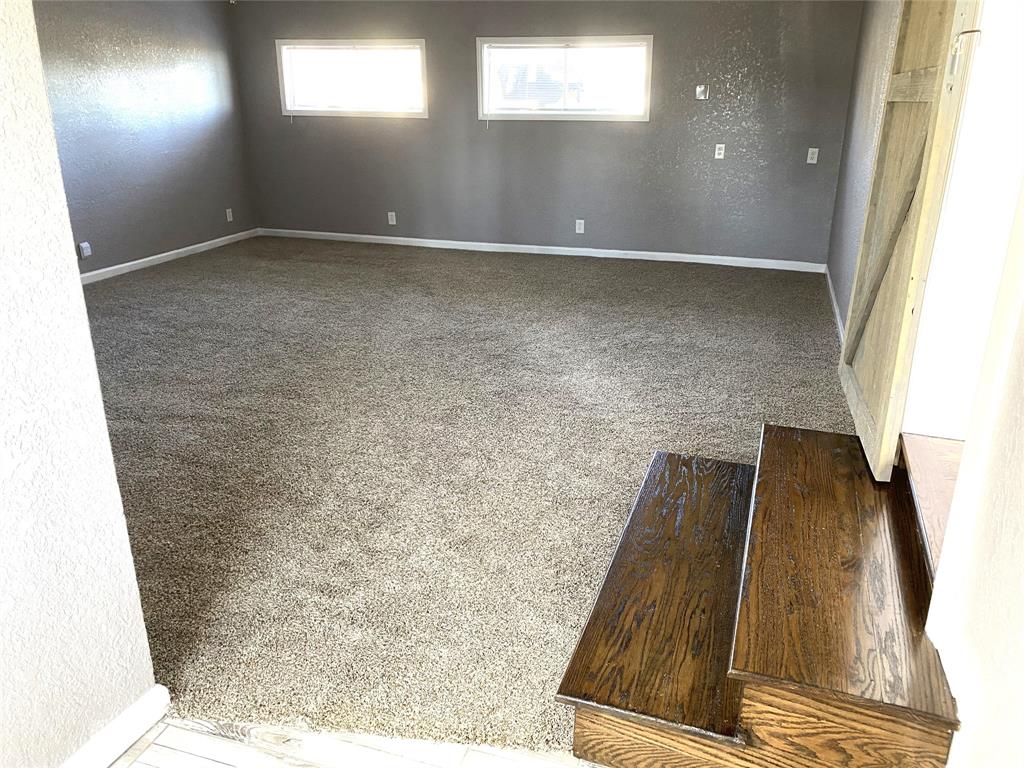 704 Scurlock Street Grandview, TX 76050 - Photo 11 of 11 a view of wooden floor