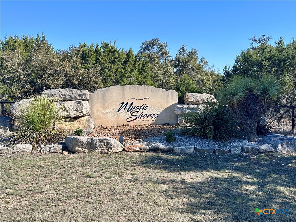 206 Vista View Place Spring Branch, TX 78070 - Photo 2 of 24 a sign on the side of the road
