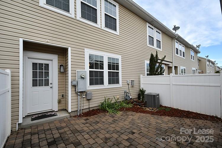 8204 Viewpoint Lane Cornelius, NC 28031 - Photo 25 of 27 a view of a house with a small yard