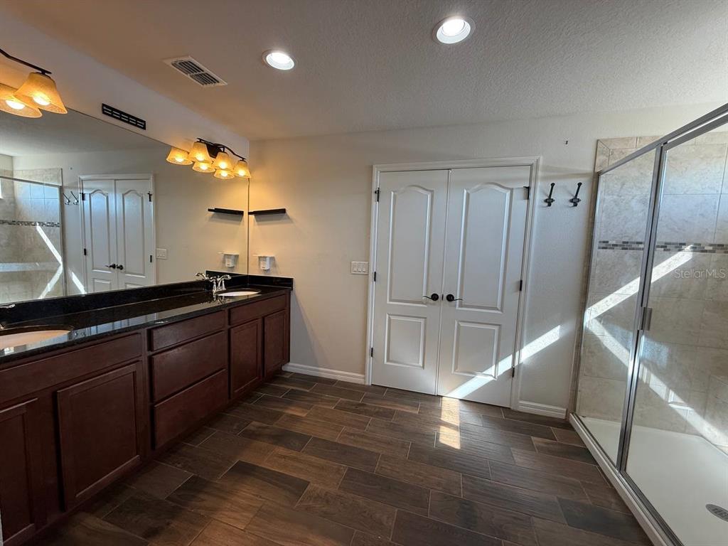 14112 Poke Ridge Drive Riverview, FL 33579 - Photo 21 of 32 a kitchen with a sink and cabinets