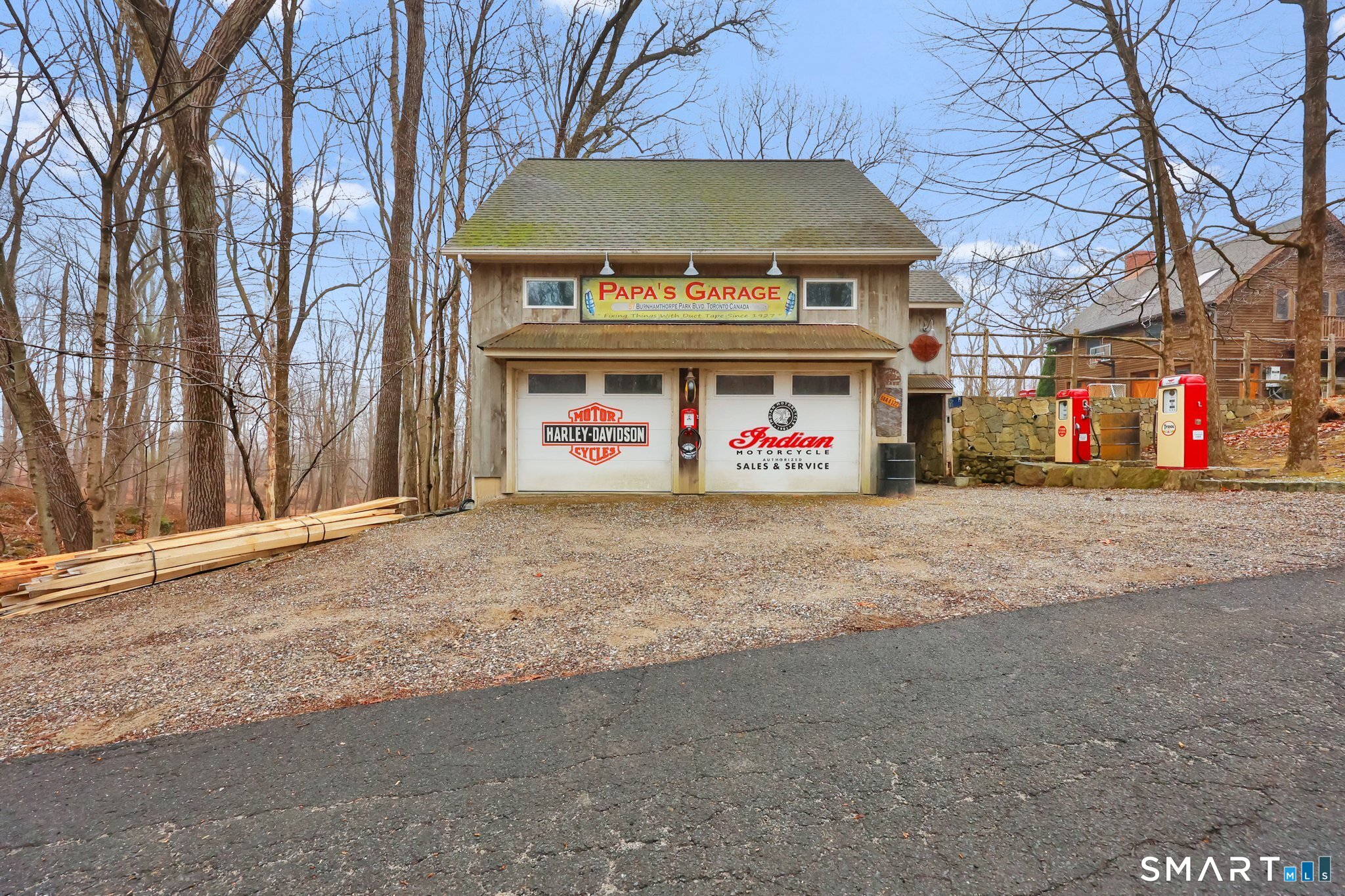 142 Seventy Acre Road Redding, CT 06896 - Photo 33 of 40 a front view of building with retail shops