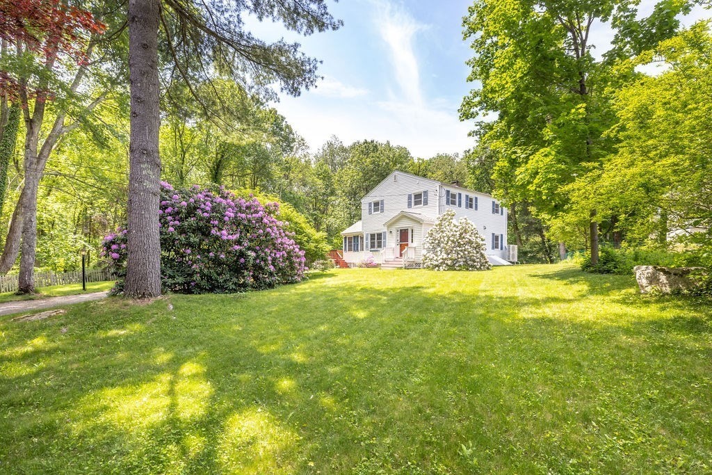 21 Vanderbelt Road Acton, MA 01720 - Photo 28 of 36 a house view with swimming pool in front of it