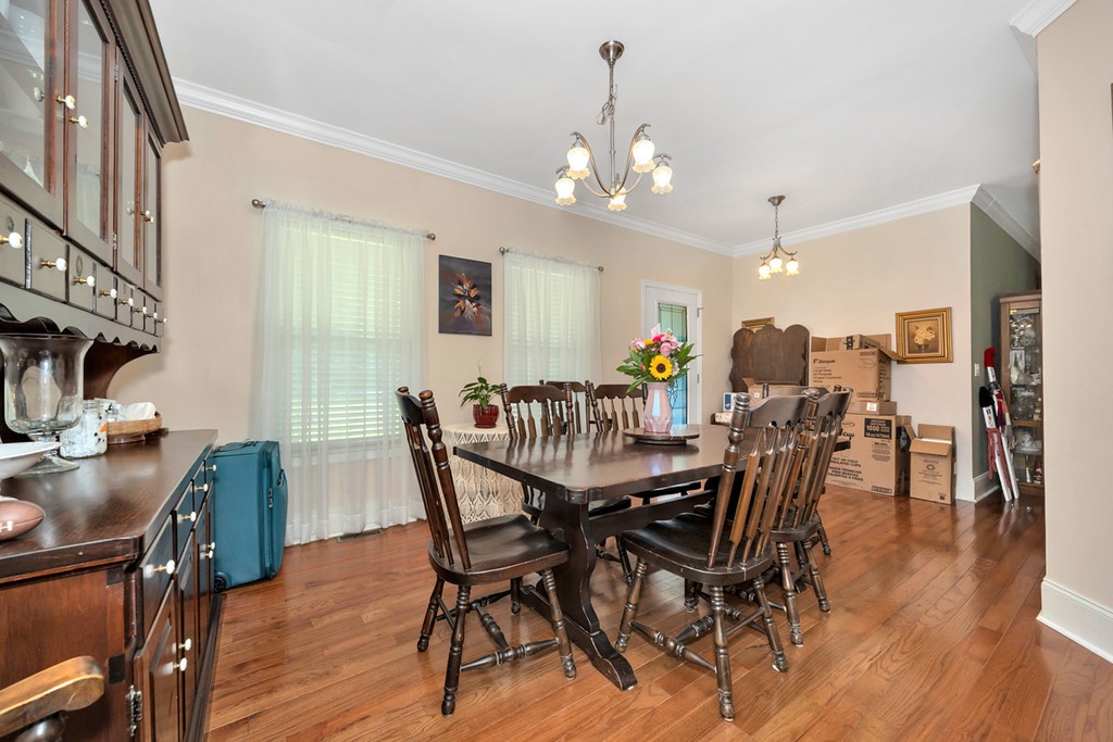 84 Scott Orchard Road Taft, TN 38488 - Photo 12 of 23 a view of a dining room with furniture and wooden floor