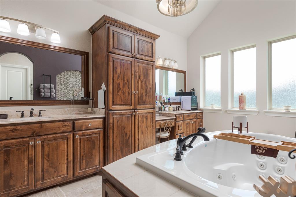 835 Bentwater Lucas, TX 75002 - Photo 14 of 40 a bathroom with a sink and a mirror