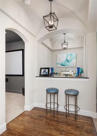 a room with a table and chairs