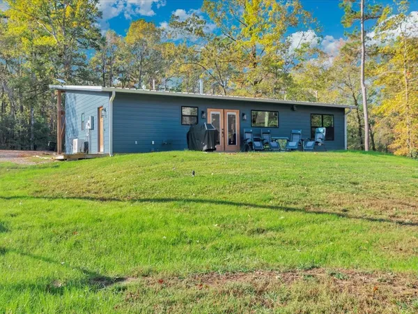 a view of a backyard with a garden