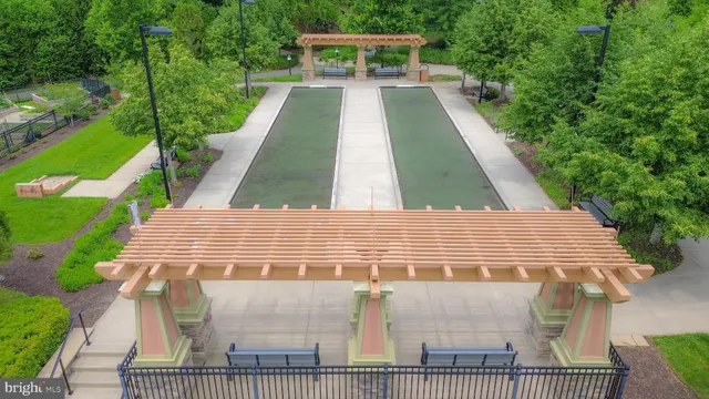 a view of a yard with large trees