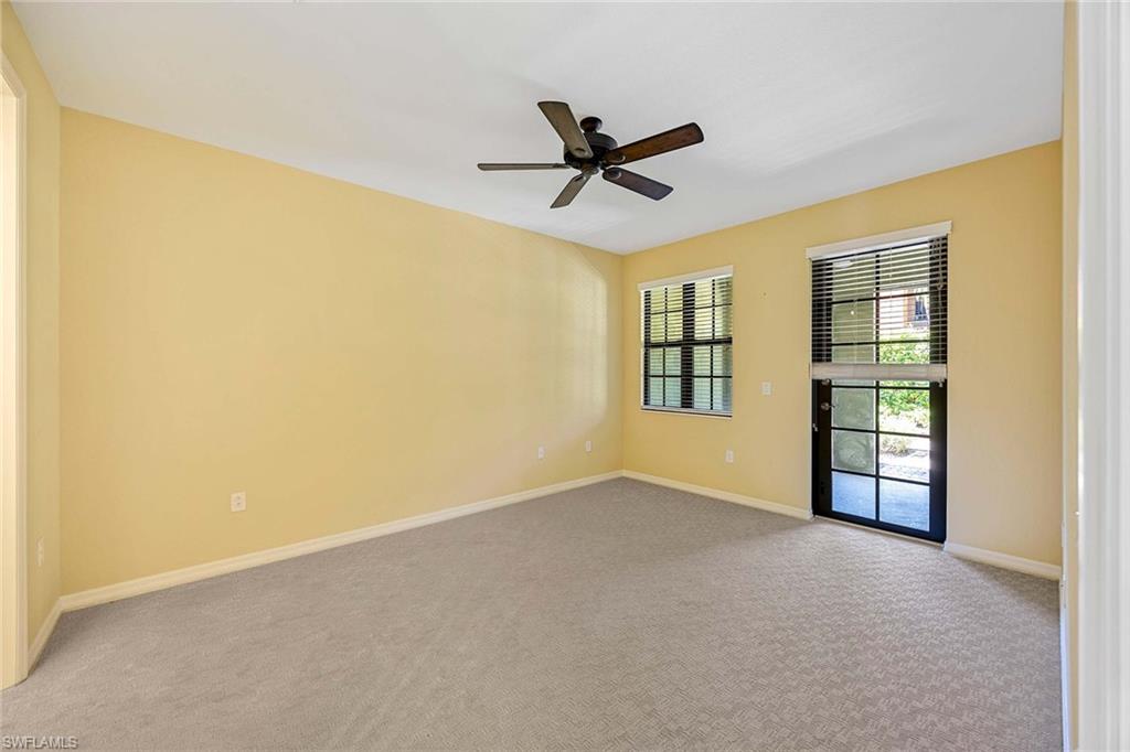 9036 Alturas Street, Unit 3603 Naples, FL 34113 - Photo 11 of 41 a view of an empty room with a window