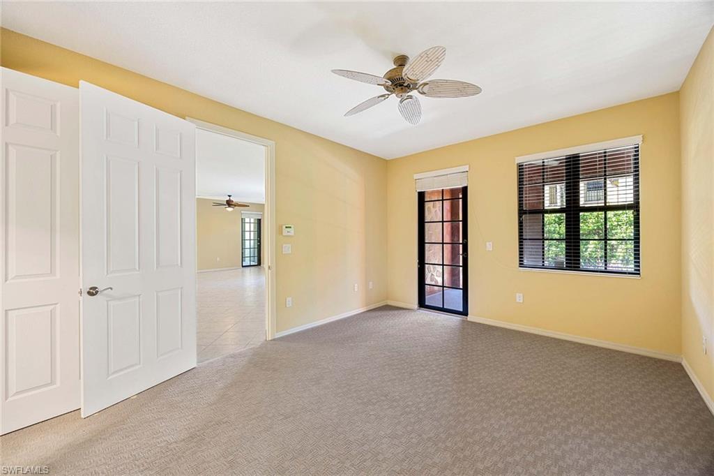 9036 Alturas Street, Unit 3603 Naples, FL 34113 - Photo 16 of 41 a view of an empty room with a window