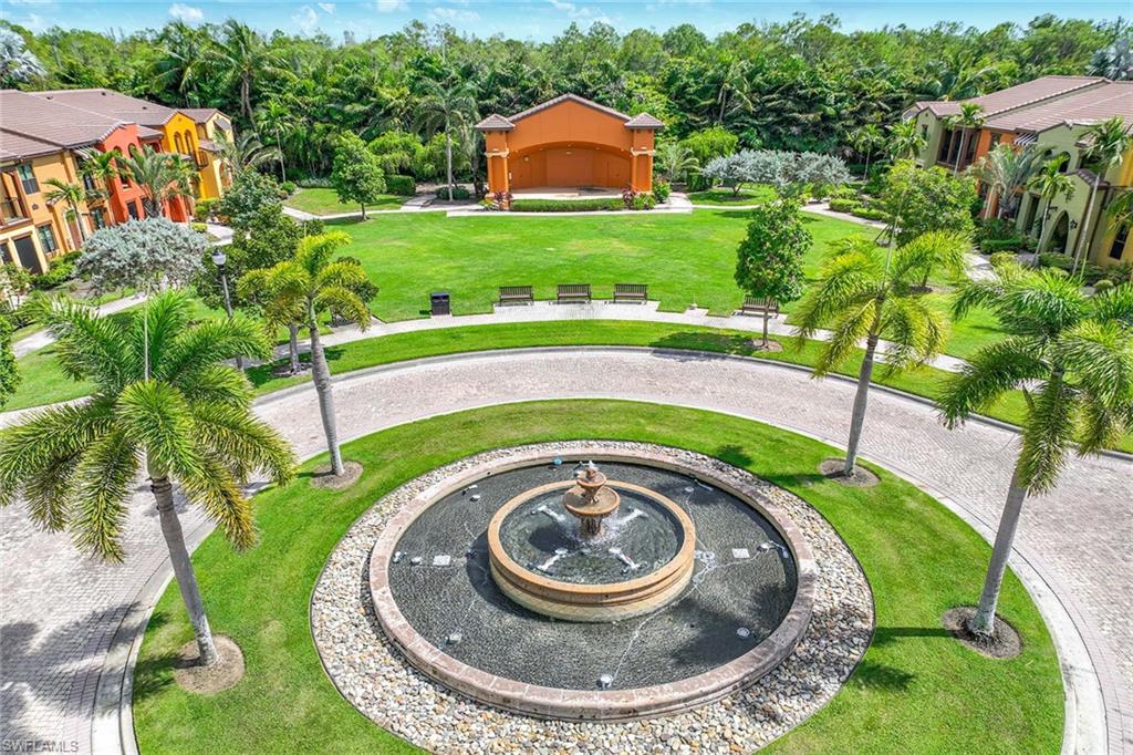 9036 Alturas Street, Unit 3603 Naples, FL 34113 - Photo 27 of 41 an aerial view of a house with outdoor space and trees all around