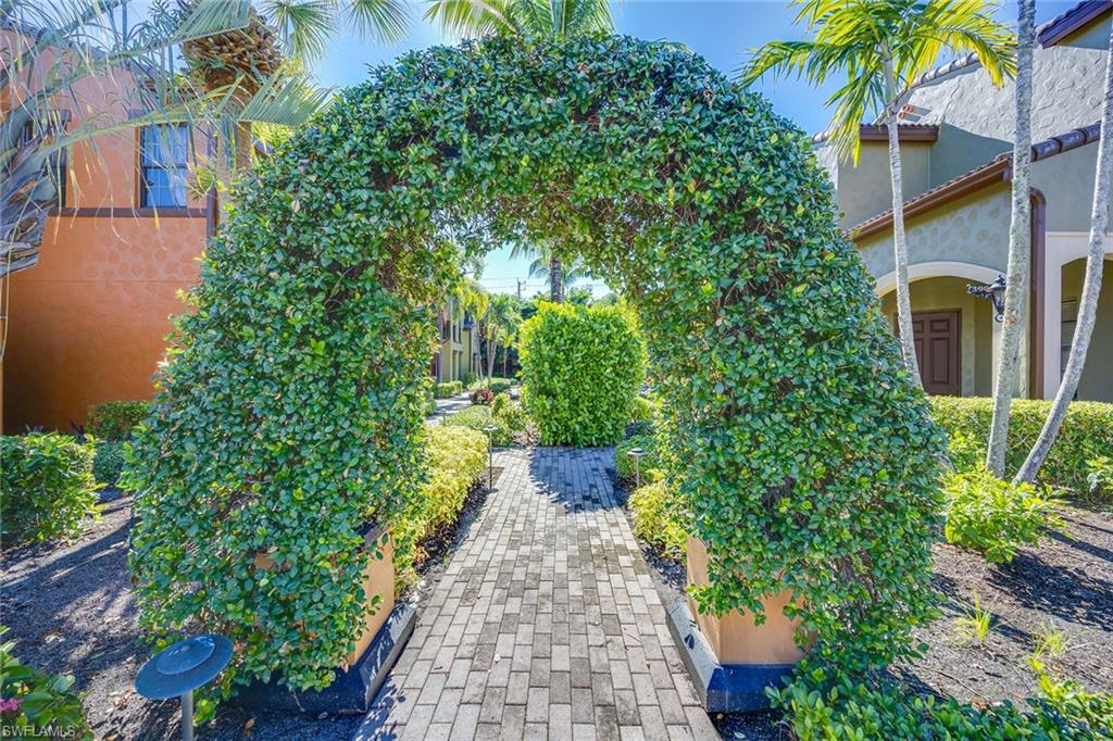 9036 Alturas Street, Unit 3603 Naples, FL 34113 - Photo 3 of 41 a view of a pathway with plants