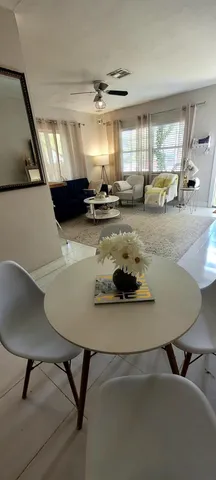 a room with gym equipment and a large window