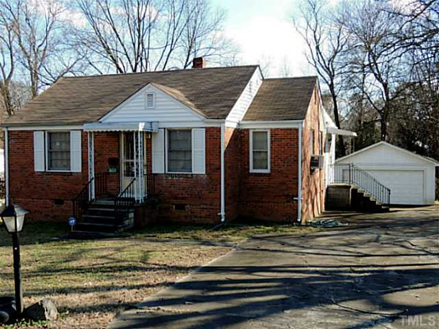 2114 Milburnie Road Raleigh, NC 27610 - Photo 1 of 14 a view of a house with a yard