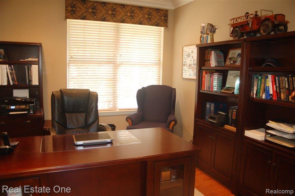 2453 Winding Brook Court, Unit 50 Rochester, MI 48309 - Photo 7 of 19 library or dining.JPG