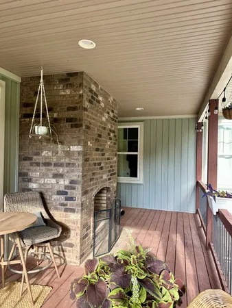 a backyard of a house with seating space