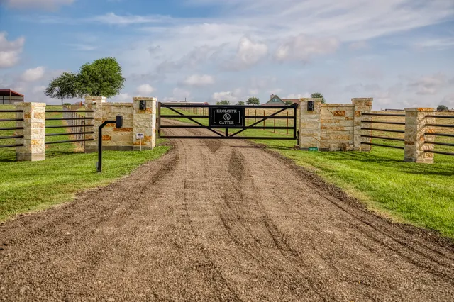 a view of a house with a big yard