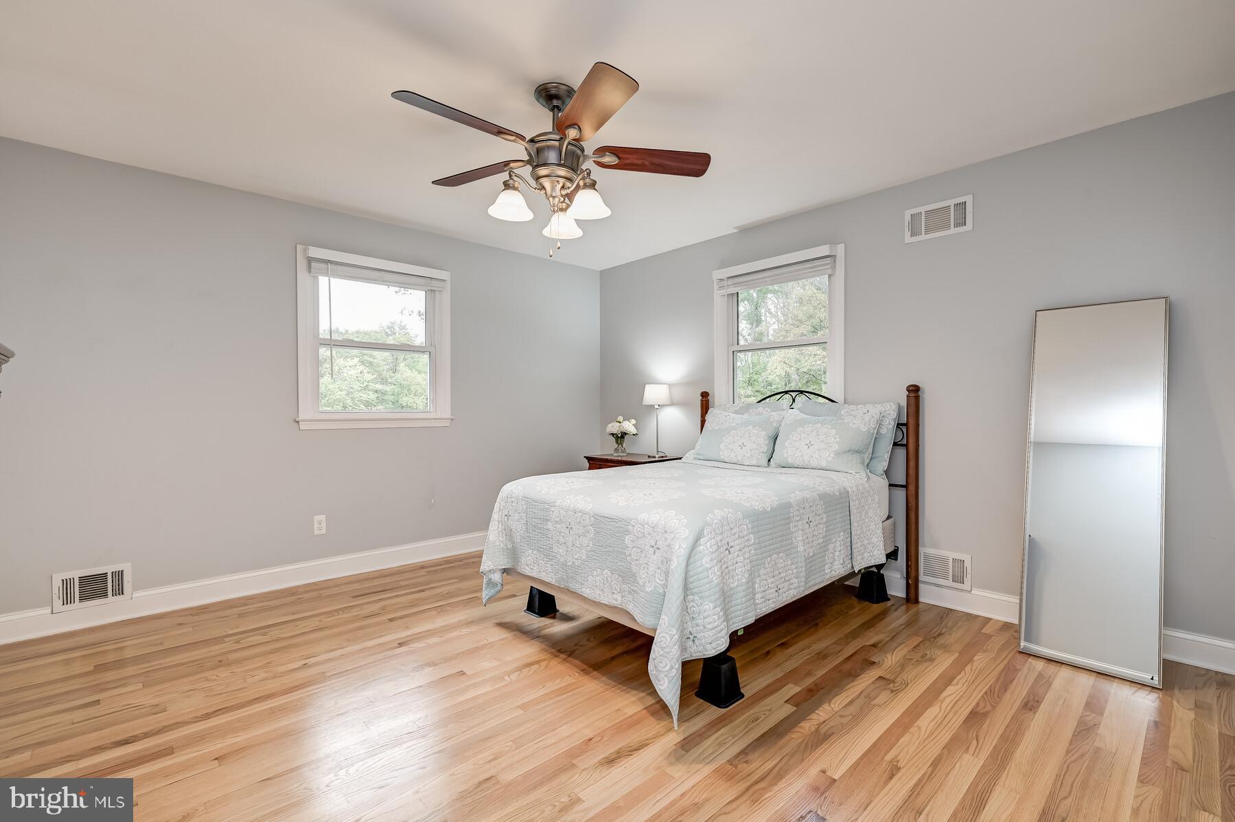 414 Edgewater Road Pasadena, MD 21122 - Photo 21 of 40 Primary bedroom with double closets and water view